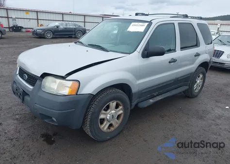 2003 Ford Escape Xlt z USA, uszkodzony, nr VIN 1FMYU03193KA78387